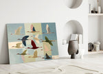 a flock of stylized cranes in flight panel bringing character to a minimalist living room wall