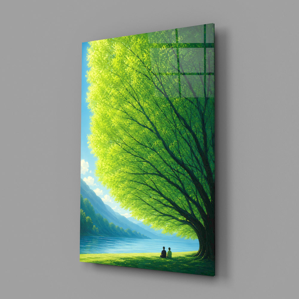 two friends beneath a sprawling tree glass wall art angled to show the polished tempered glass panel