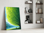 two friends beneath a sprawling tree panel resting in a shelving niche in a modern interior