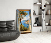 a harbor seen through open shutters glass wall art leaning beside a dark leather sofa