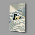 black cat reading in striped bedding glass wall art angled to show the polished tempered glass panel