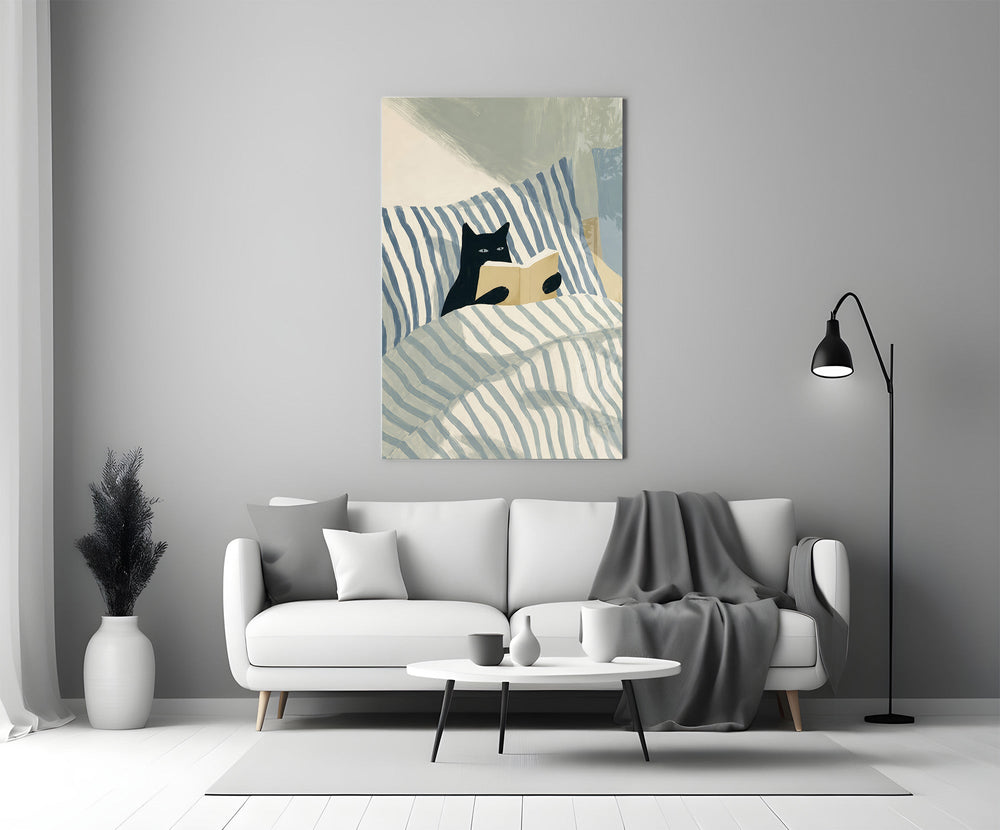 black cat reading in striped bedding panel bringing character to a minimalist living room wall