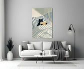 black cat reading in striped bedding panel bringing character to a minimalist living room wall