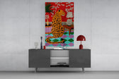 spotted leopard in a bold interior glass wall art styled in an atmospheric room setting