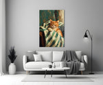 sleeping ginger cat in a striped blanket panel bringing character to a minimalist living room wall