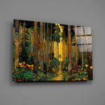 golden forest path through patterned trunks glass wall art angled to show the polished tempered glass panel