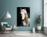 white horse portrait on black glass wall art styled above an armchair in a reading corner