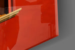 Close-up detail of the open orange book hiding the face and the bare legs on the sill on the glass surface