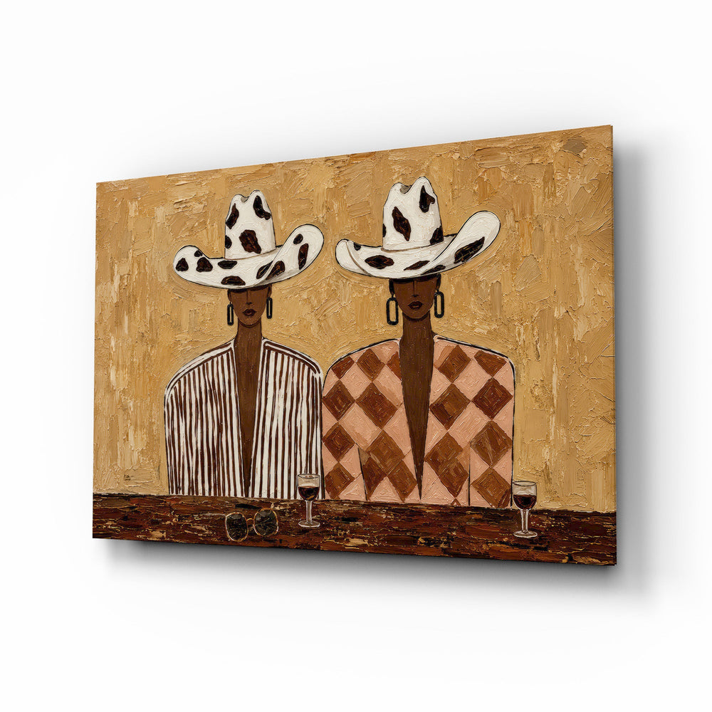 Cowgirl Duo Cow-Print Hats Warm Tones Glass Wall Art - Lifestyle preview in a designer interior