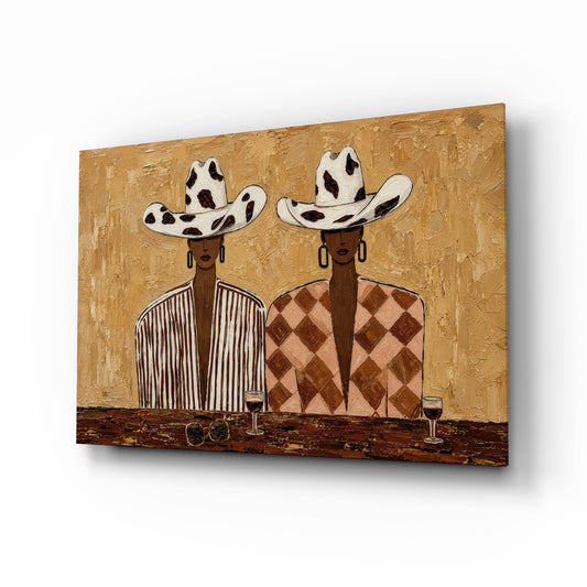 Cowgirl Duo Cow-Print Hats Warm Tones Glass Wall Art - Lifestyle preview in a designer interior