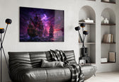 pirate galleon fleet under a purple sky glass wall art styled above an armchair in a reading corner