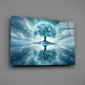 frozen turquoise tree in a winter landscape glass wall art angled to show the polished tempered glass panel