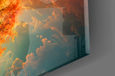 Close-up detail of the fiery orange canopy and setting sun doubled on still water on the glass surface