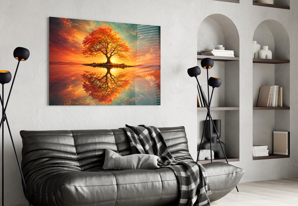 autumn tree at sunset on a mirror lake glass wall art styled above an armchair in a reading corner