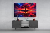 crimson tree under a fiery cosmic sky glass wall art styled in an atmospheric room setting
