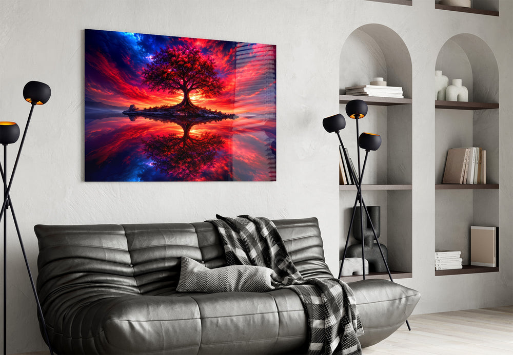 crimson tree under a fiery cosmic sky glass wall art styled above an armchair in a reading corner