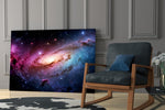a pink and blue spiral galaxy panel resting in a shelving niche in a modern interior