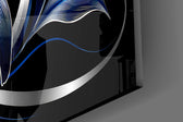 Close-up detail of the silver-outlined blue petals against a deep black ground on the glass surface