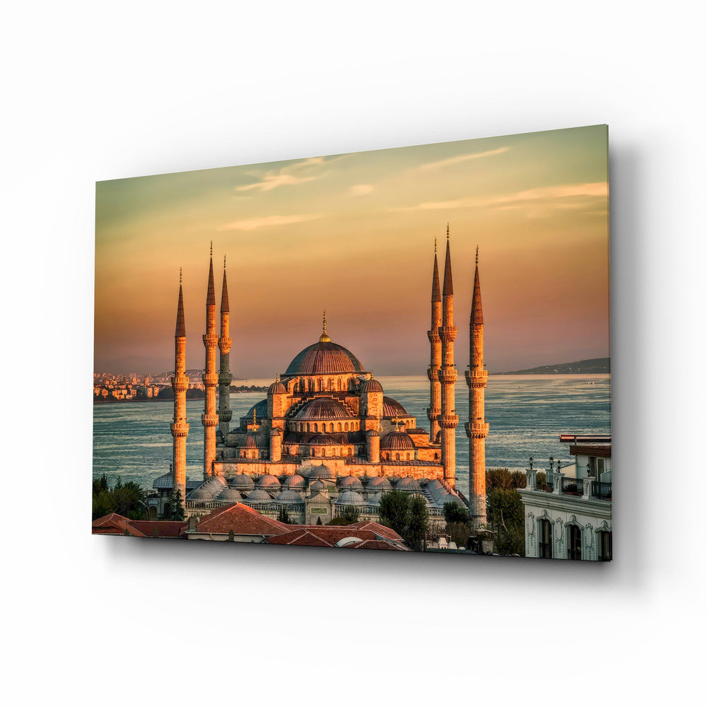Golden Sunset Six-Minaret Mosque Glass Wall Art - Lifestyle preview in a designer interior