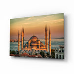 Golden Sunset Six-Minaret Mosque Glass Wall Art - Lifestyle preview in a designer interior