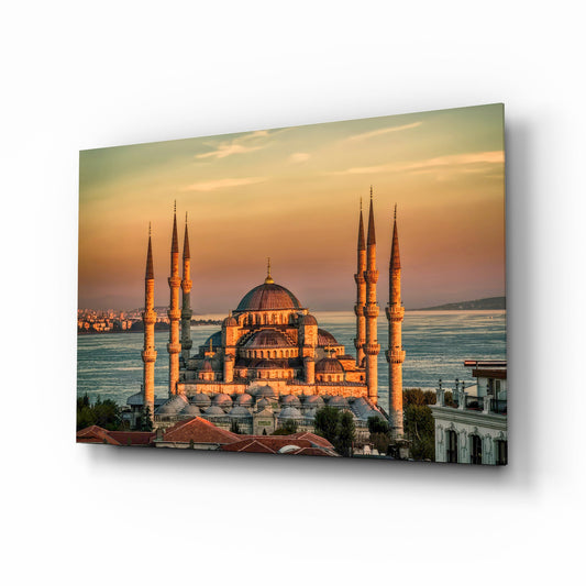 Golden Sunset Six-Minaret Mosque Glass Wall Art - Lifestyle preview in a designer interior