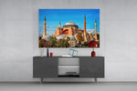 terracotta domed basilica under blue sky glass wall art styled in an atmospheric room setting