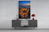 twilight aerial view of an illuminated mosque glass wall art styled in an atmospheric room setting