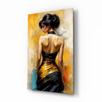 Golden Grace woman in black and gold gown glass wall art - lifestyle preview in a designer interior