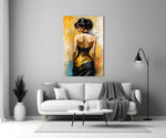 Black and gold figure glass panel bringing warmth to a minimalist living room wall