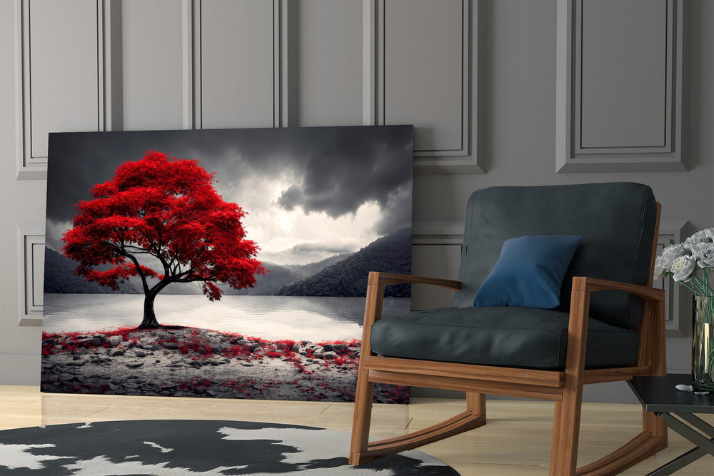Red maple tree on a grey lake glass wall art in a styled modern space
