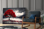 Red maple tree on a grey lake glass wall art in a styled modern space