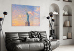 Statue of Liberty glass wall art styled in a contemporary living room