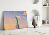 Statue of Liberty glass wall art leaning against a wall in a minimalist interior