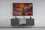 Statue of Liberty glass wall art displayed above a console in a modern interior