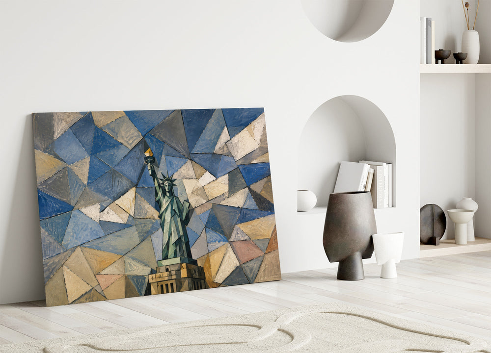 Statue of Liberty glass wall art leaning against a wall in a minimalist interior