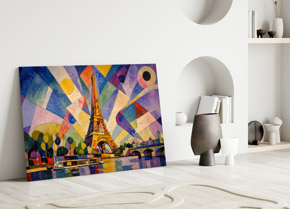 Eiffel Tower glass wall art leaning against a wall in a minimalist interior