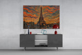 Eiffel Tower glass wall art displayed above a console in a modern interior