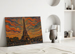 Eiffel Tower glass wall art leaning against a wall in a minimalist interior