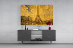 Eiffel Tower glass wall art displayed above a console in a modern interior