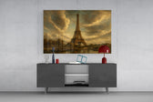 Eiffel Tower glass wall art displayed above a console in a modern interior