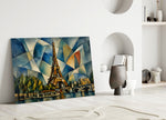 Eiffel Tower glass wall art leaning against a wall in a minimalist interior