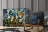 Eiffel Tower glass wall art hanging as a focal point in a modern room