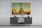 Eiffel Tower glass wall art displayed above a console in a modern interior