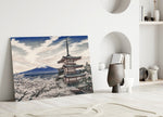 Mount Fuji Pagoda glass wall art leaning against a wall in a minimalist interior