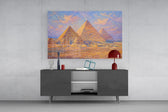 Pyramids of Giza glass wall art displayed above a console in a modern interior