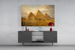 Pyramids of Giza glass wall art displayed above a console in a modern interior