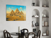 Pyramids of Giza glass wall art shown in a warm, styled interior setting