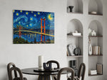 Istanbul Bosphorus Bridge glass wall art shown in a warm, styled interior setting