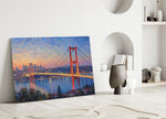 Istanbul Bosphorus Bridge glass wall art leaning against a wall in a minimalist interior