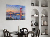 Istanbul Bosphorus Bridge glass wall art shown in a warm, styled interior setting